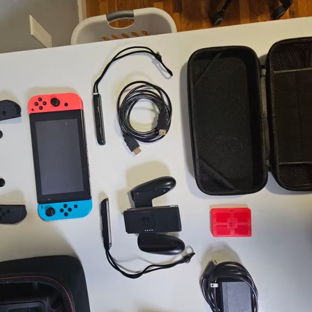 Nintendo Switch with Accessories - Picture 4 of 12